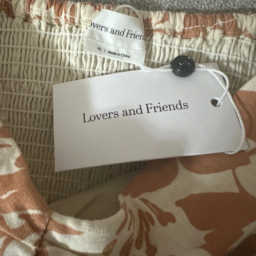 Lovers and Friends nude floral strapless bandeau top